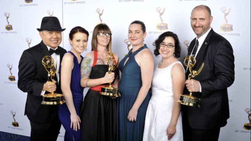 The Lizzie Bennet Diaries team posing with Emmy statuettes at the 65th Creative Arts Emmy Awards. From left to right: Bernie Su, Ashley Clements, Alexandra Edwards, Jenni Powell, Margaret Dunlap, and Jay Bushman.